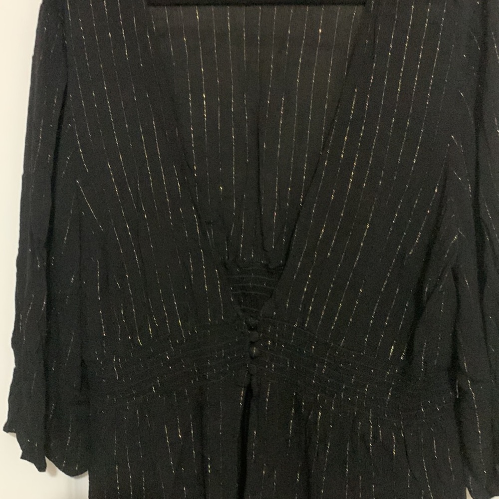 A torrid must have for any season!! Size 1 99% Rayon 1 % other fiber